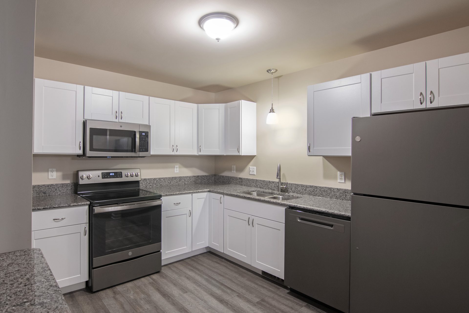 A Kitchen with Stainless Steel Appliances and White Cabinets